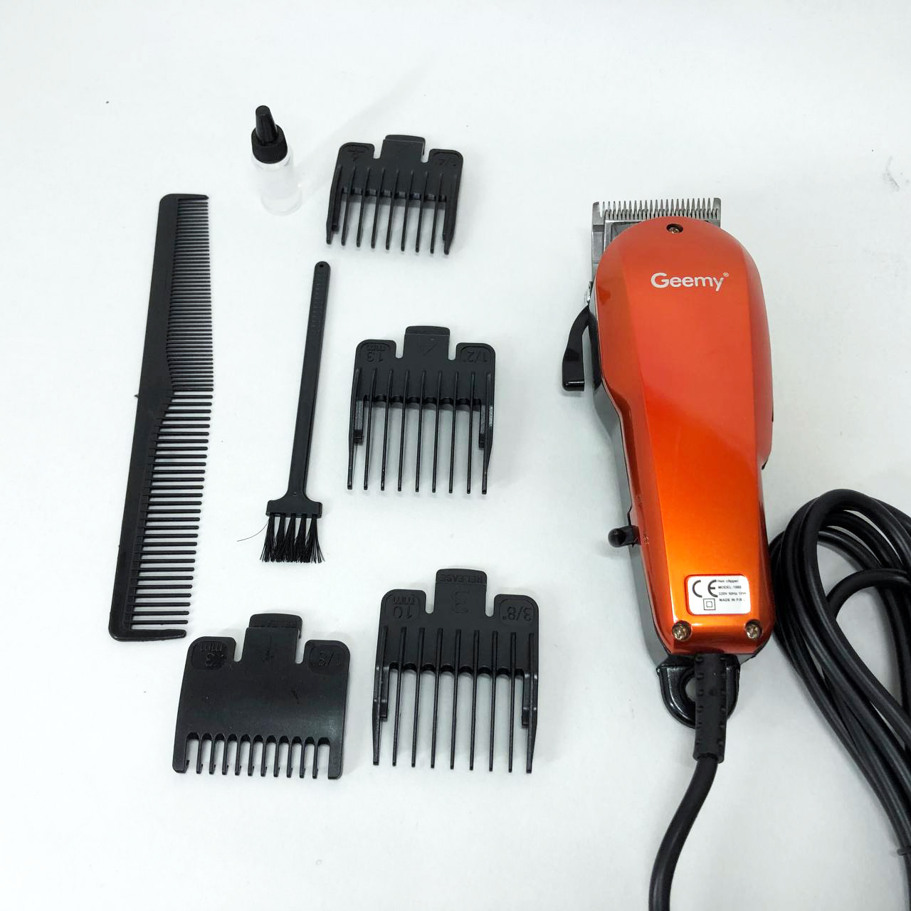 Машинка для стрижки GEMEI GM-1005 — 4 насадки, леза з нержавіючої сталі — изображение 17