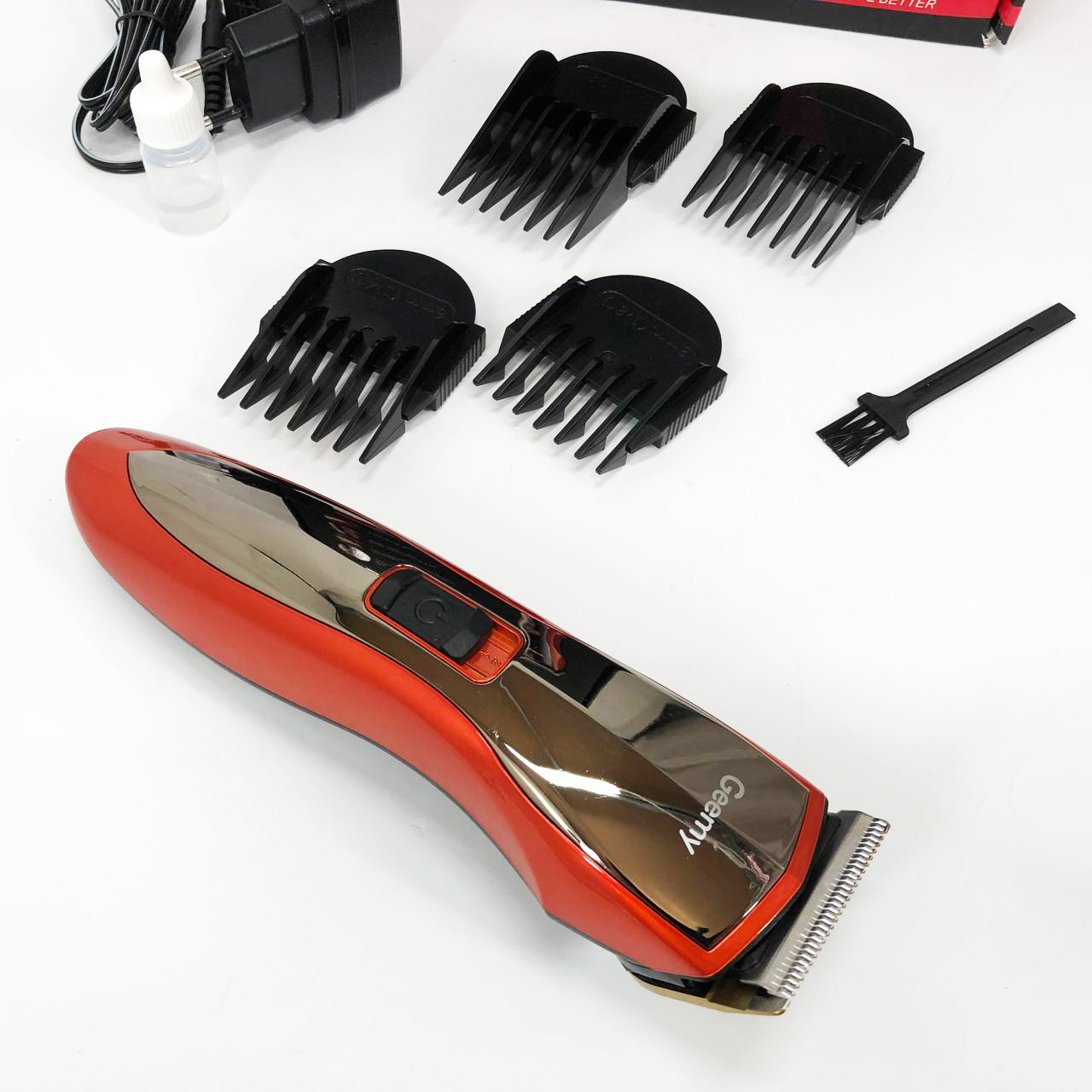 Машинка для стрижки Gemei GM-6027 — бездротова 60 хв, 4 насадки — изображение 17