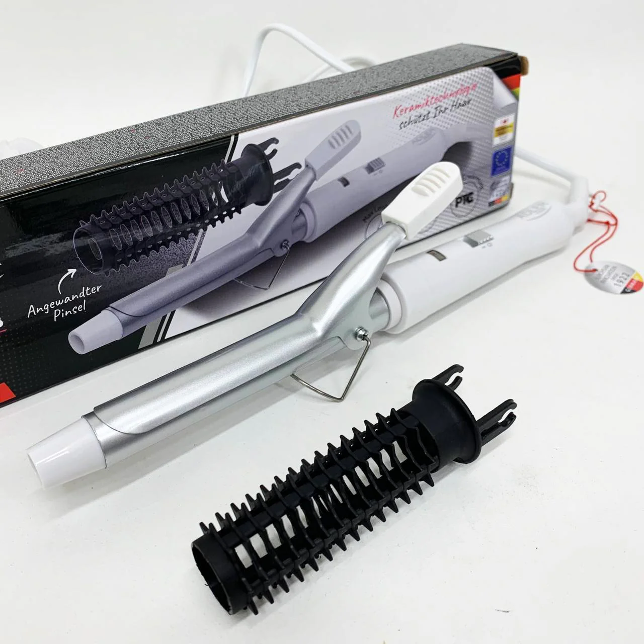 Плойка для волос Adler AD 2105 - 25 Вт, керамічне покриття для стильних локонів.