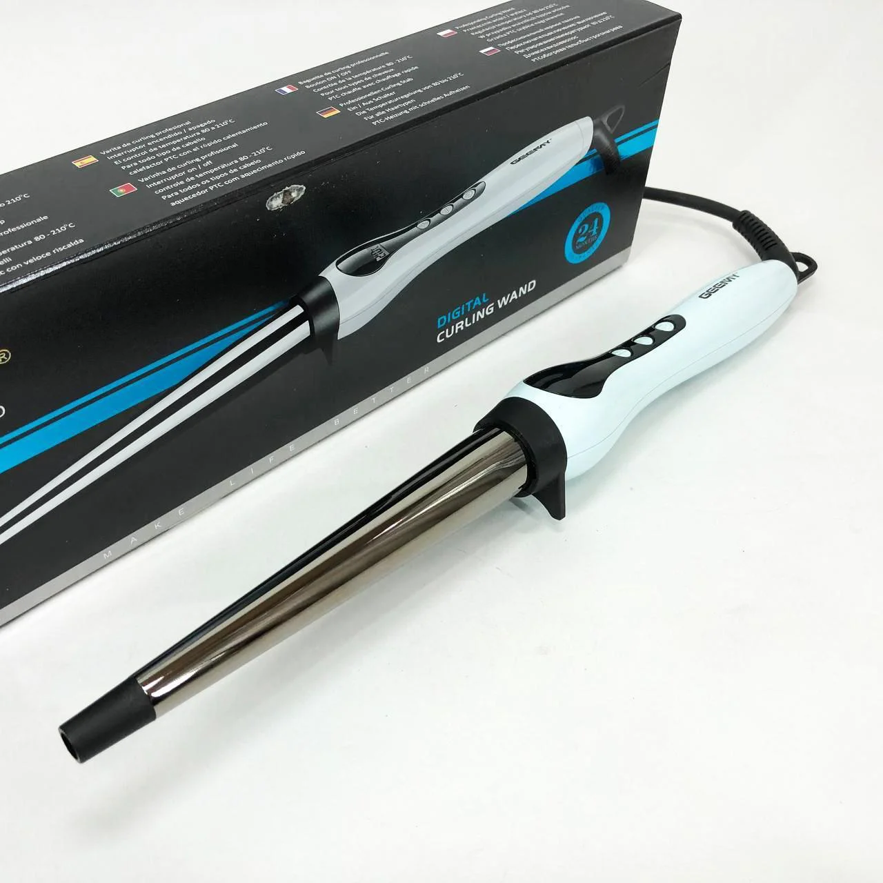 Конусна плойка Gemei GM-403 для легкого створення локонів без пошкодження волосся.